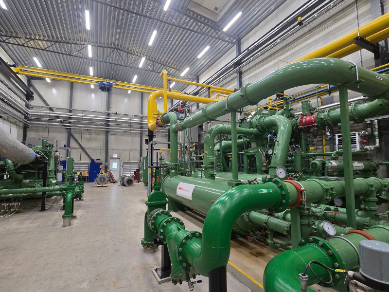 A centrifugal air compressor green pipes in a factory Ingersoll Rand
