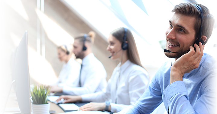 Customer support team wearing headsets.