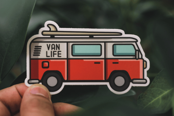 A van-shaped die cut sticker.