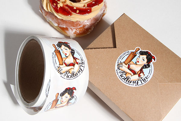 Bakery logo sticker sealing a box