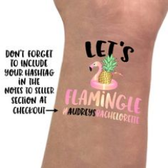 Notebook with university sitkcers on it