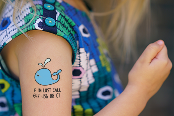 "If lost" temporary tattoo on child