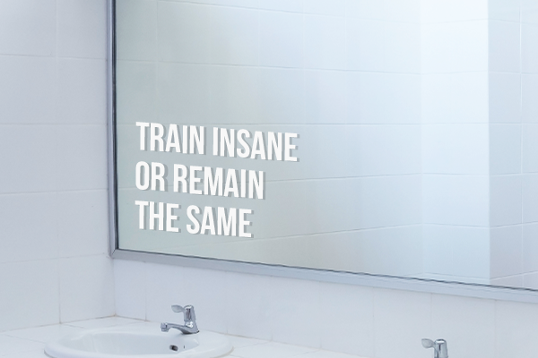 Vinyl lettering on a locker room mirror