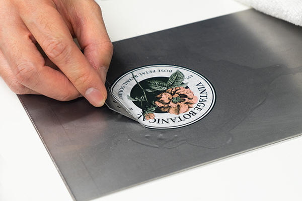 How to remove stickers from metal with soapy water.