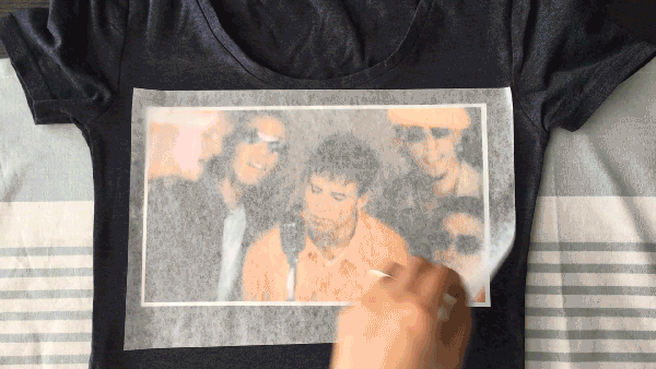 Peeling off parchment paper from iron-on transfer