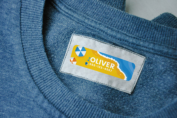 Custom kids iron-on label on a clothing tag