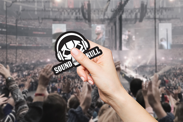 Notebook with university sitkcers on it