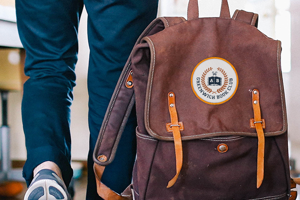 Book club patch on backpack