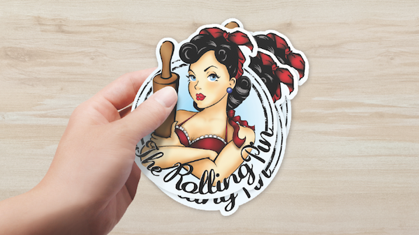 Die-cut single being held up