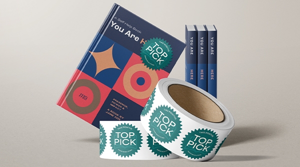 Textbook with roll label in front. Label says "Top Pick" and one sticker is one the book.