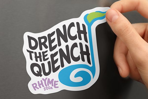 brand-magnet-being-placed-on-fridge