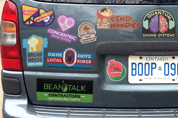 Hand out bumper stickers to for brand awareness on the go