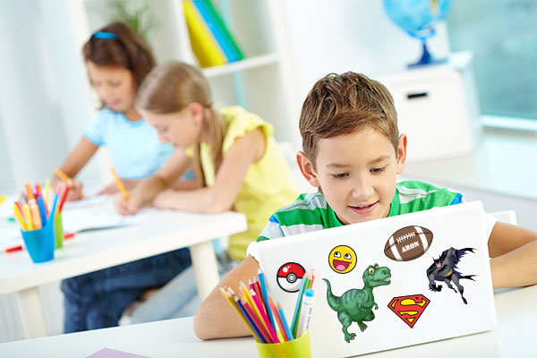 Child using laptop at school