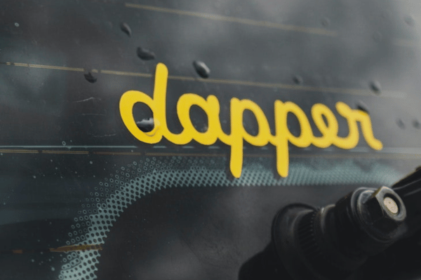 A sticker printer in operation, producing intricate designs on premium vinyl paper.