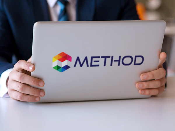 Business logo transfer sticker on the back of a laptop