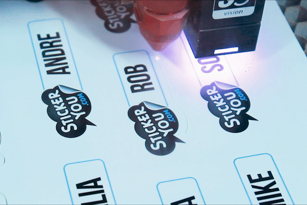 GIF of badges being cut