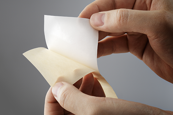 How can I remove leftover residue when I remove types of stickers?