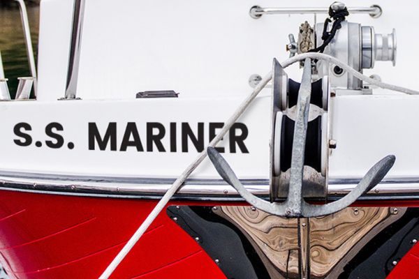 Black vinyl name lettering in the front of the boat