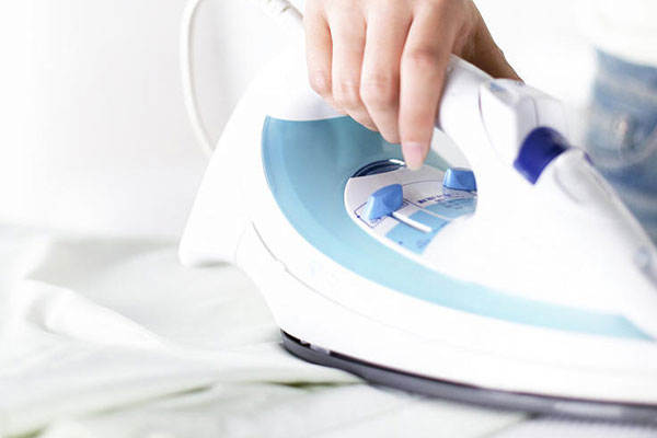 Person ironing