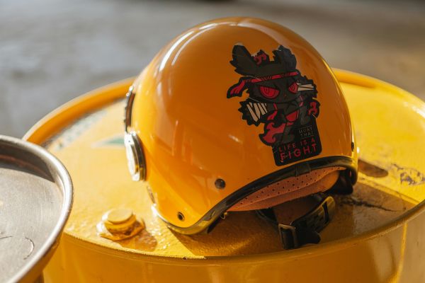 Sticker placed on a yellow helmet.