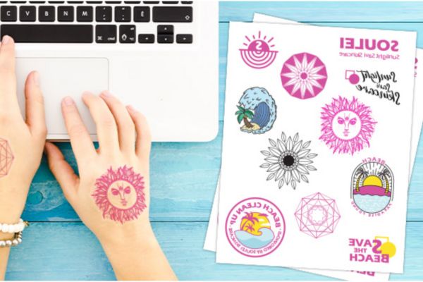 Temporary tattoos and laptop workstation.