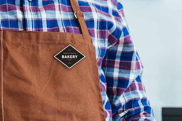 Bakery employee wearing a name badge