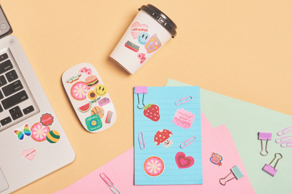 A collection of die cut stickers featuring a range of imaginative designs, shapes, and vibrant colors.