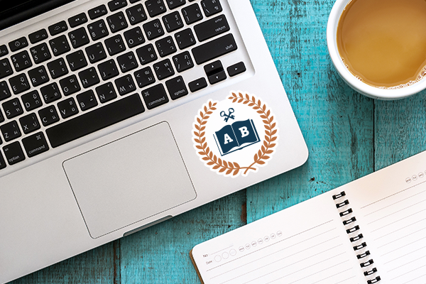 High school logo sticker on a laptop