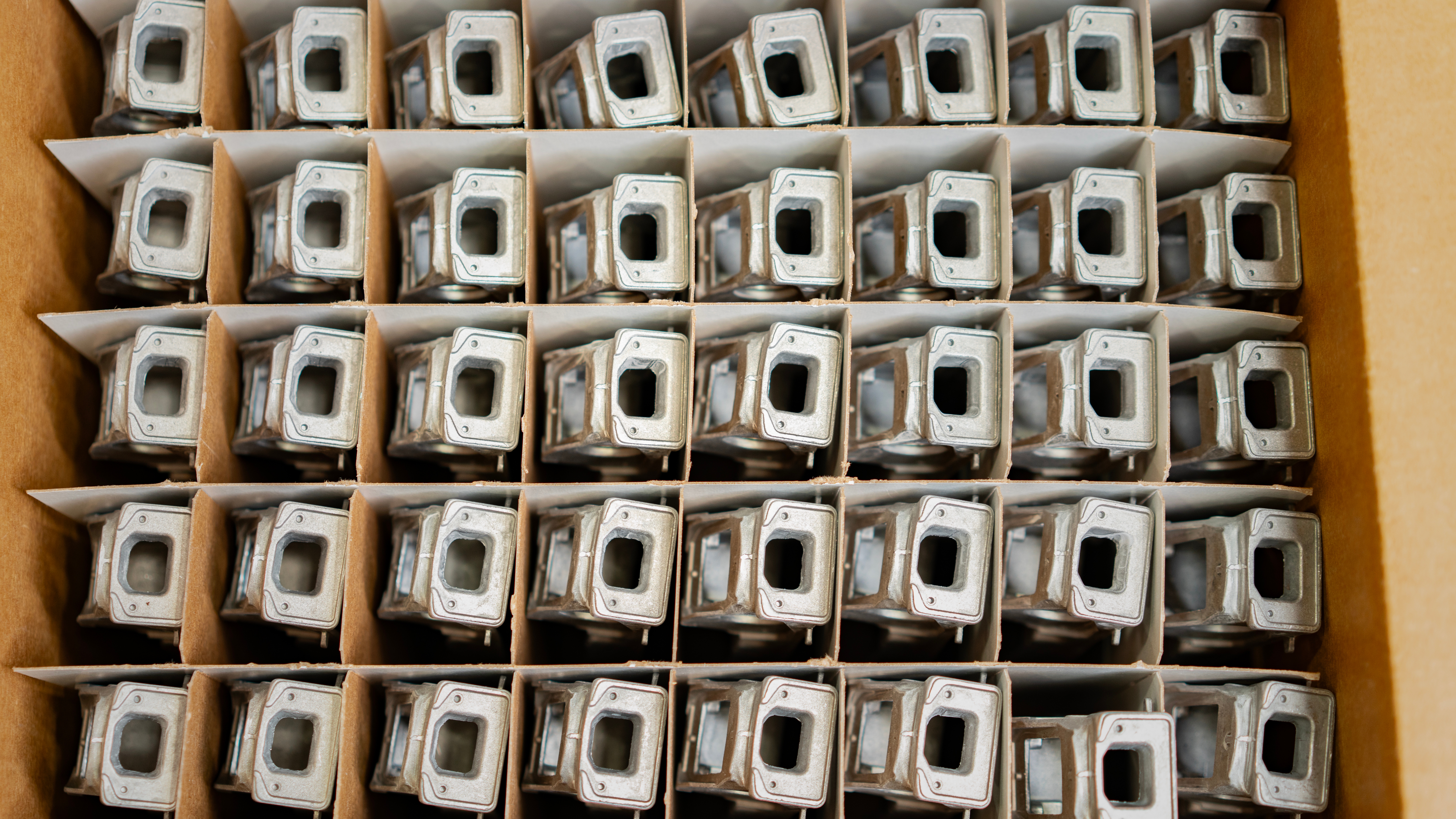 Parts organized in a box to be shipped worldwide
