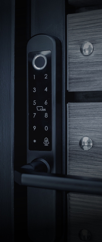 Smart lock hardware on the front door of a home