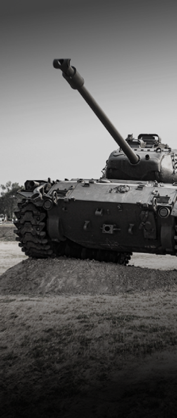 Army tank on a dirt hill