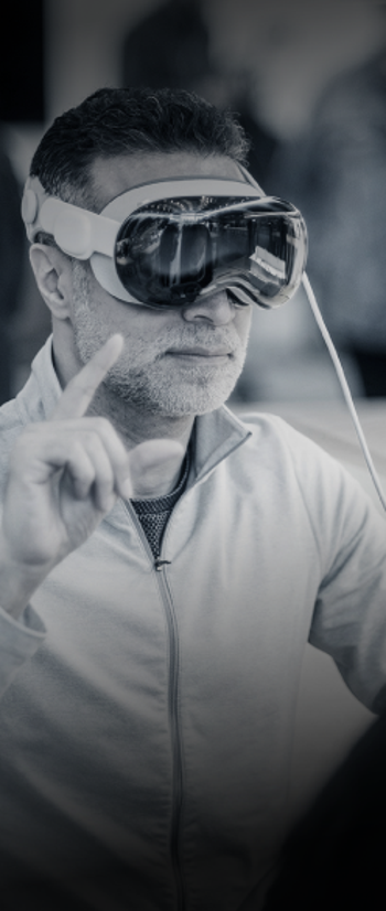 Man wearing virtual reality goggles in a consumer electronics store