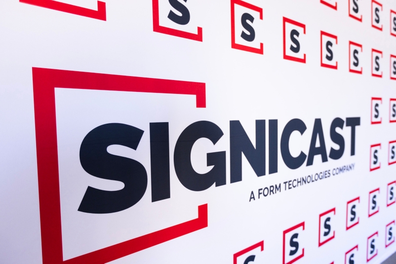 Wall with Signicast logos from MFC ribbon cutting event