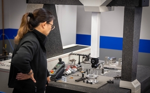 Female Dynacast engineer using protyping machines