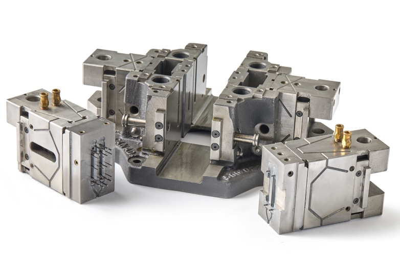 Crosshead and mold of a Techmire die casting machine