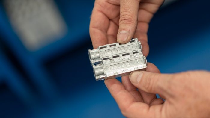 Die cast metal part after sub assembly process