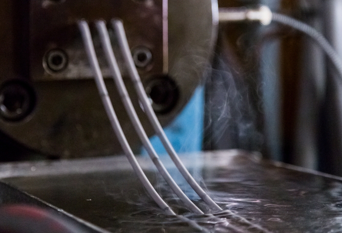 Feedstock coming out of MIM machine