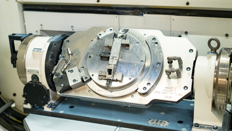 Interior of a CNC machine at Dynacast Lake Forest
