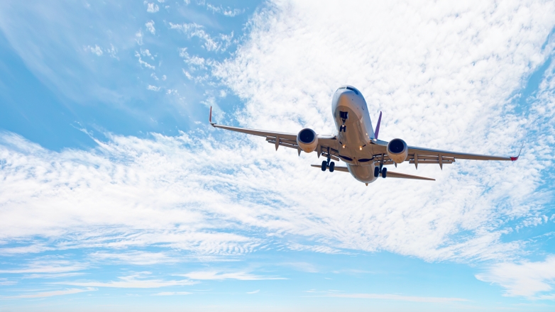 Commercial airplane flying in the sky