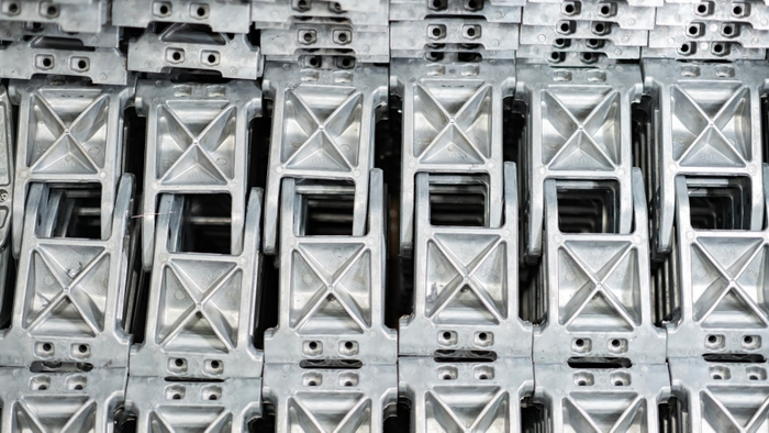 Metal die casted parts stacked in a shipping container