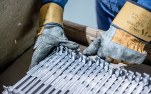 Manufacturing employee operating equipment in Peterborough