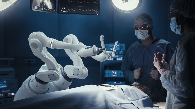 Robotic arms for a surgery table