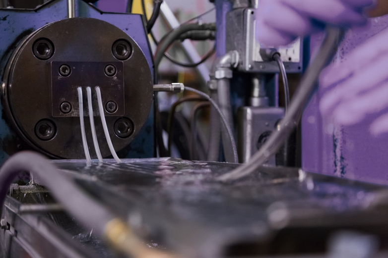 Machine producing feedstock for metal injection molding