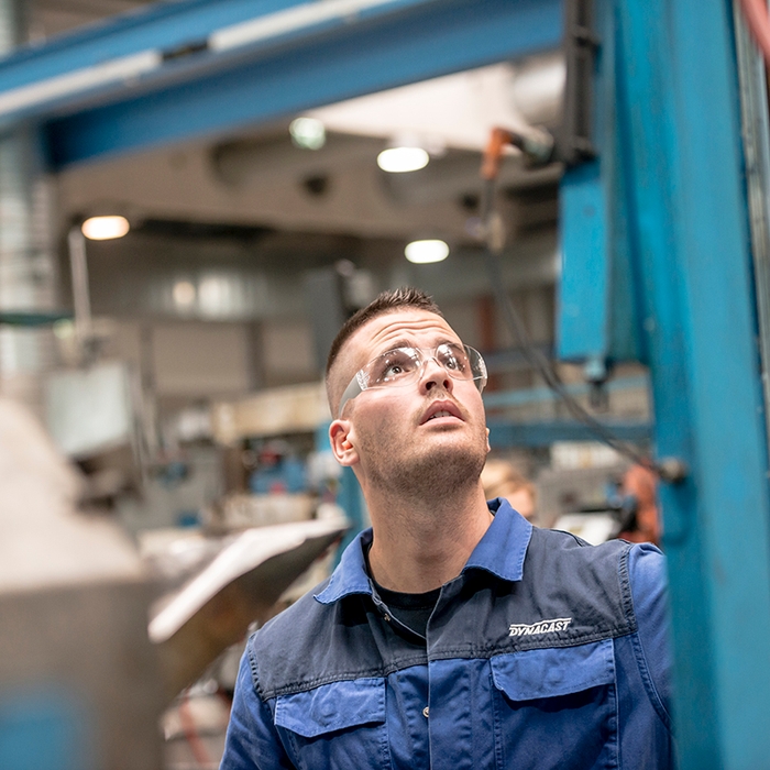 Dynacast employee in manufacturing facility
