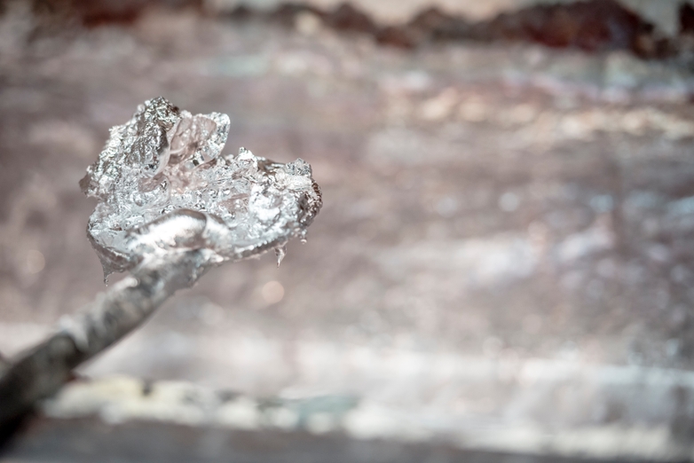 Ladel of melted metal for cold chamber die casting