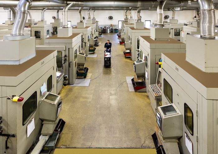 Rows of die casting machines in a facility