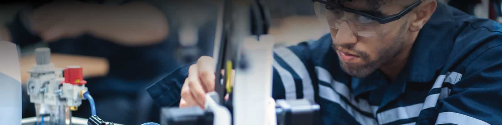 Technician using assembly tool