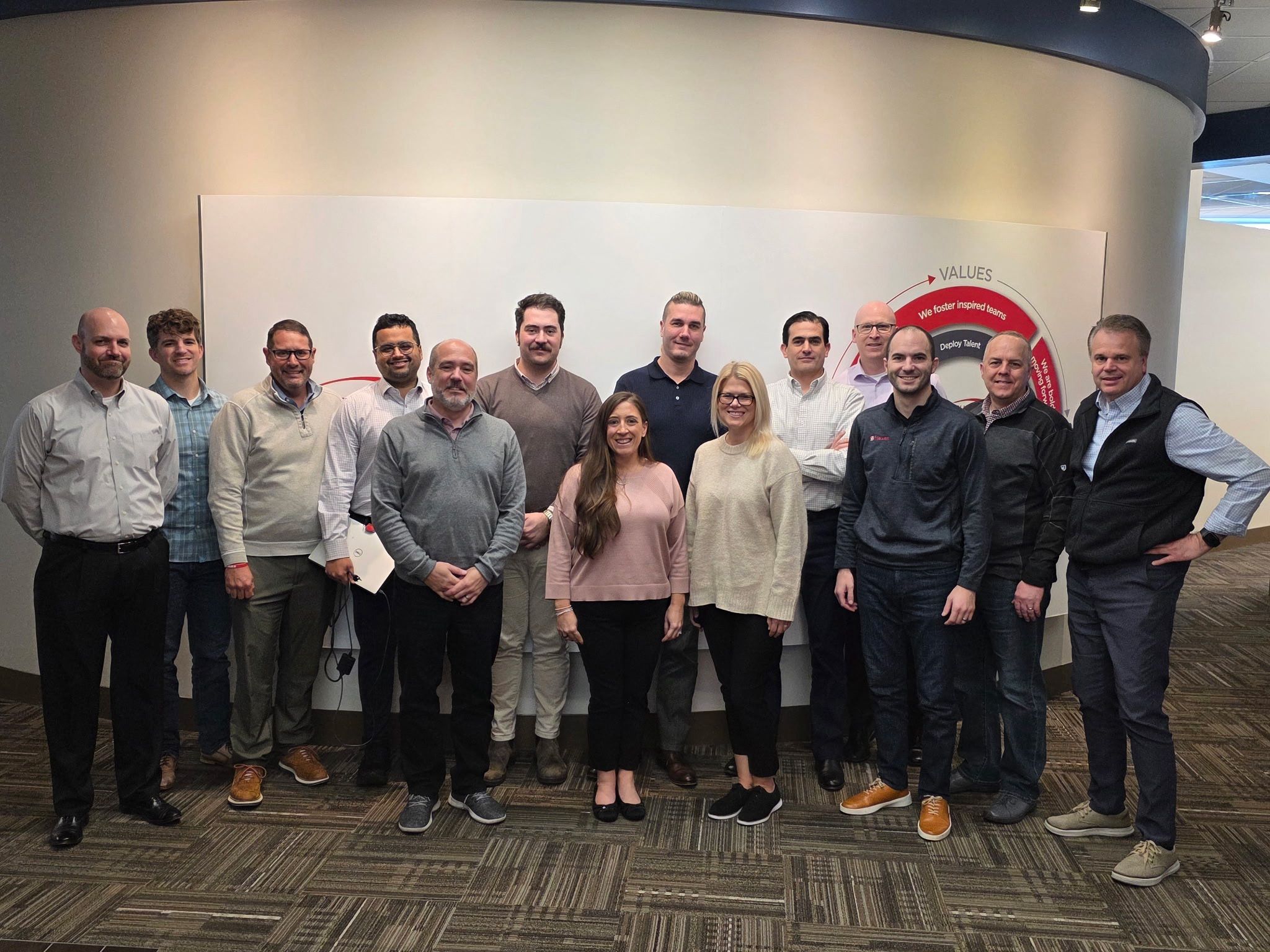 Flexan leadership team gathered at company headquarters, representing engineering, operations, manufacturing, quality, and business leadership supporting global medical device innovation.