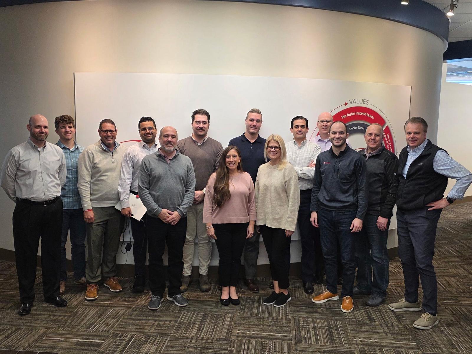 Flexan leadership team gathered at company headquarters, representing engineering, operations, manufacturing, quality, and business leadership supporting global medical device innovation.